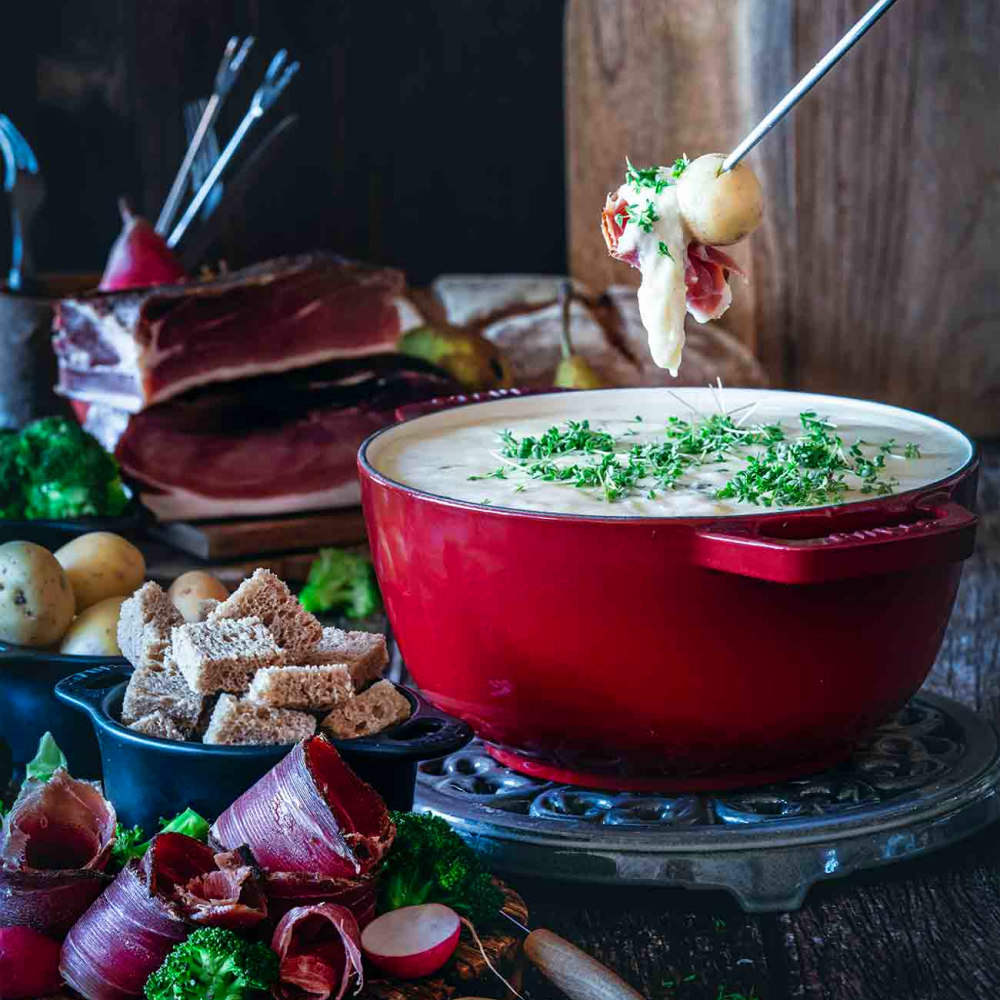 La ricetta della fonduta di formaggio con Speck Alto Adige IGP