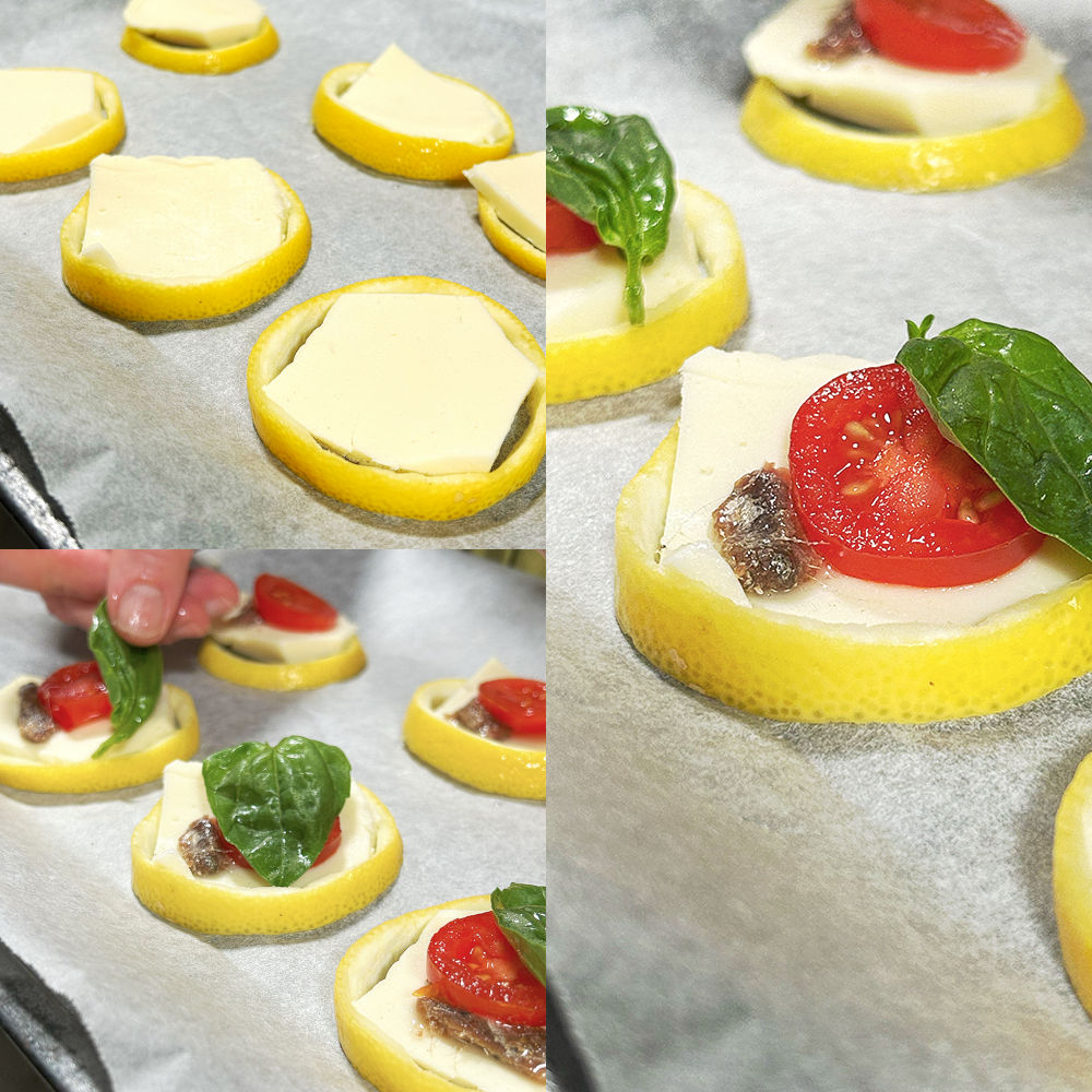 La preparazione delle pizzette su scorze di limone