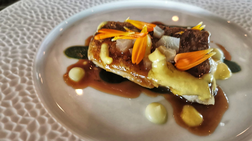 La trota bianca in crema di agrumi del Colmetto
